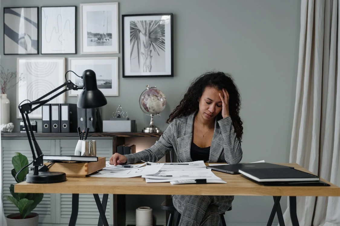 A woman stressed at work
